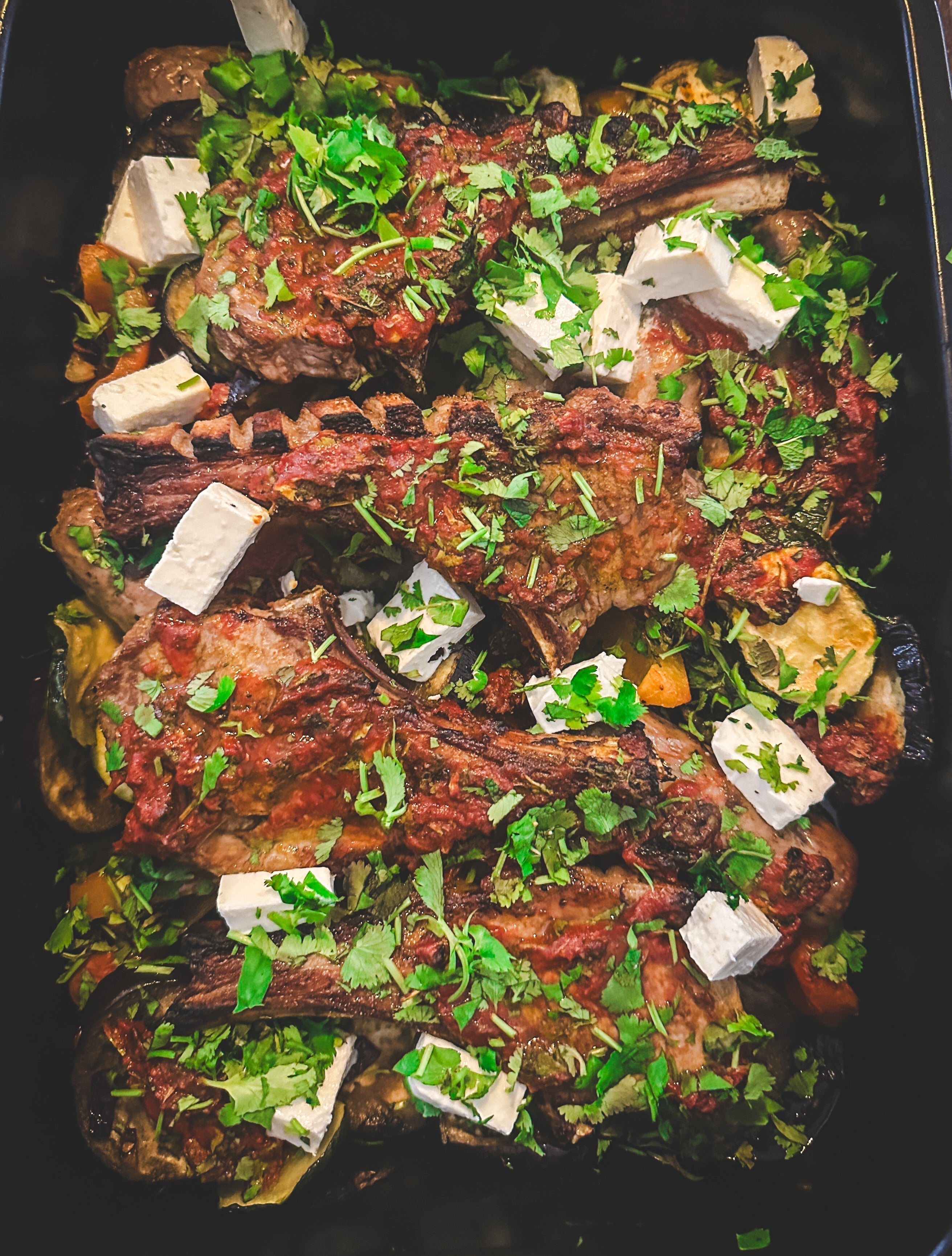 Grilled Lamb Chops & Fennel Sausages with Roasted Mediterranean Vegetables, Secret sauce and Feta