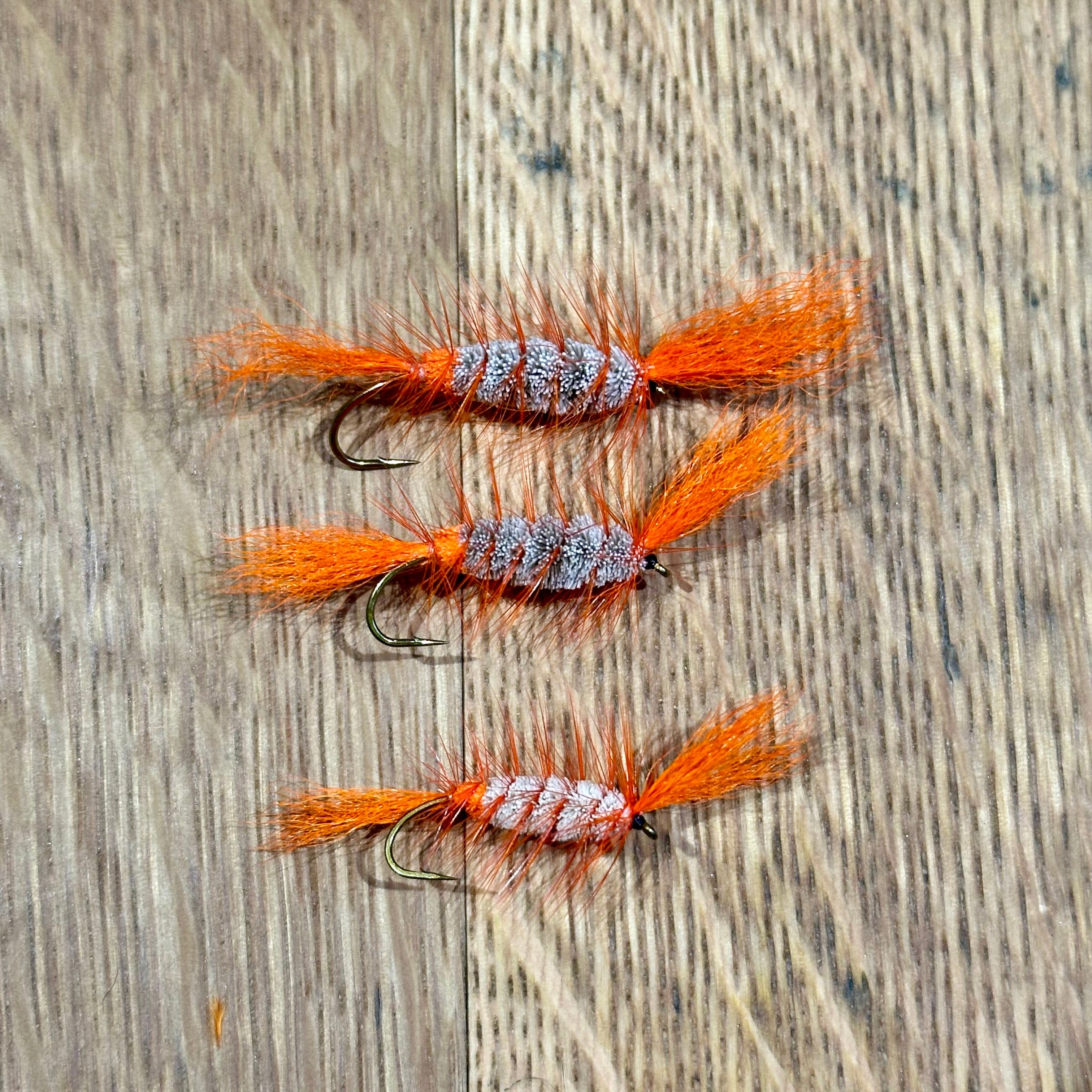 Orange Cigar Bomber flies Shadow Flies