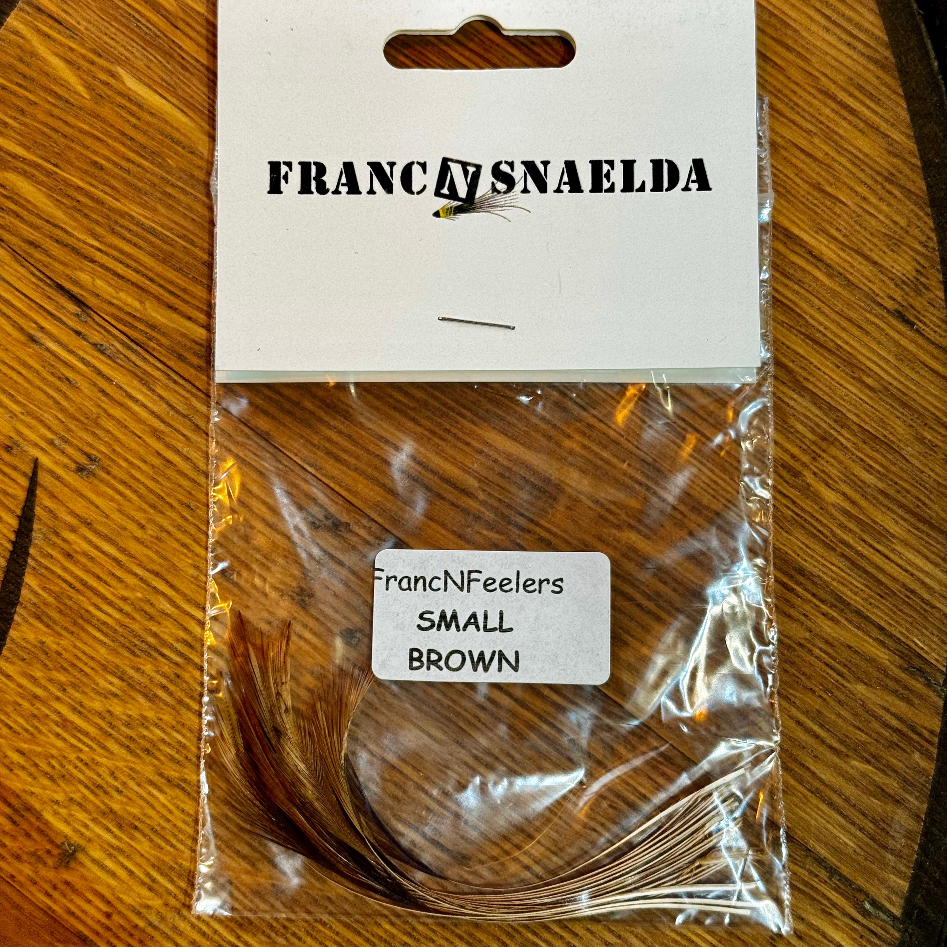 Franc N Feelers feathers Franc N Snaelda Brown